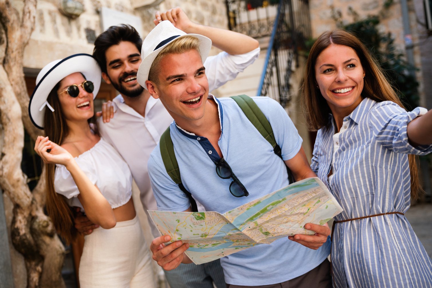 Group of friends enjoying a city tour together.